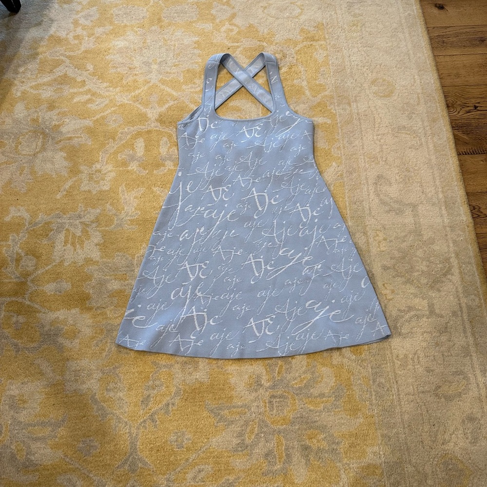 Aje is an Australian designer, their sizing is four sizes above